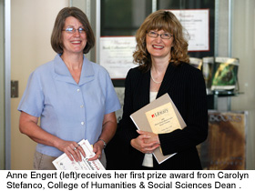 Anne Engert (left) receives her first prize award from Carolyn Stefanco