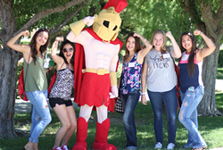 Titus with students on campus