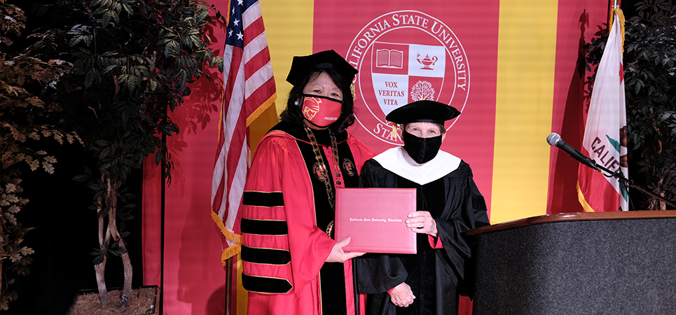 President Ellen Junn and Kenni Friedman
