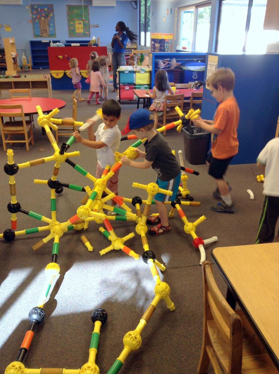 children playing in a classroom
