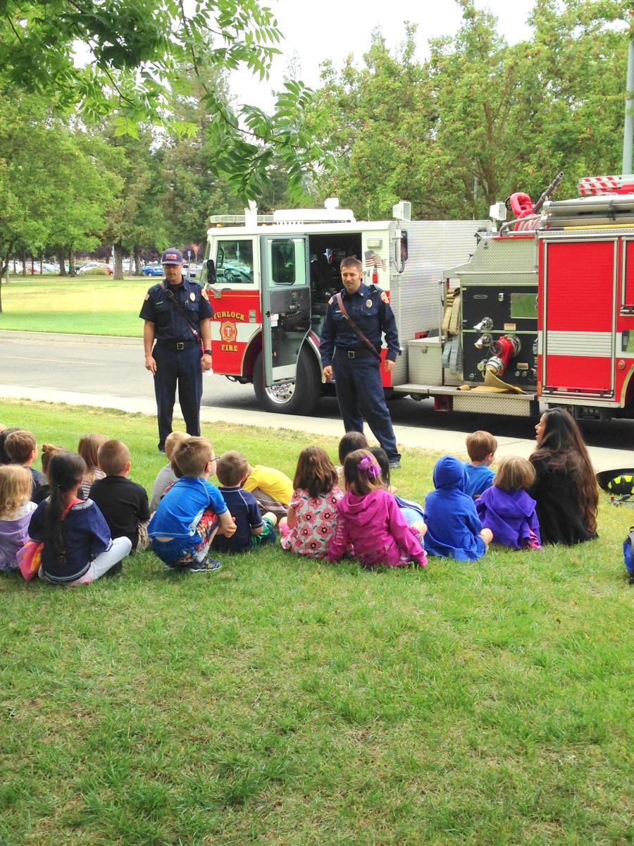 fire fighters talking to classroom