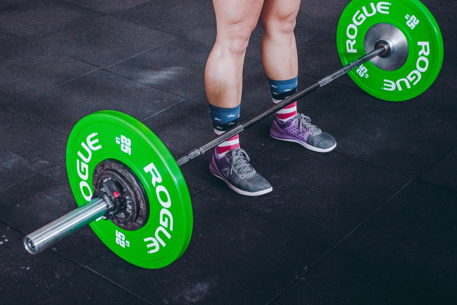 Person getting ready to do deadlift