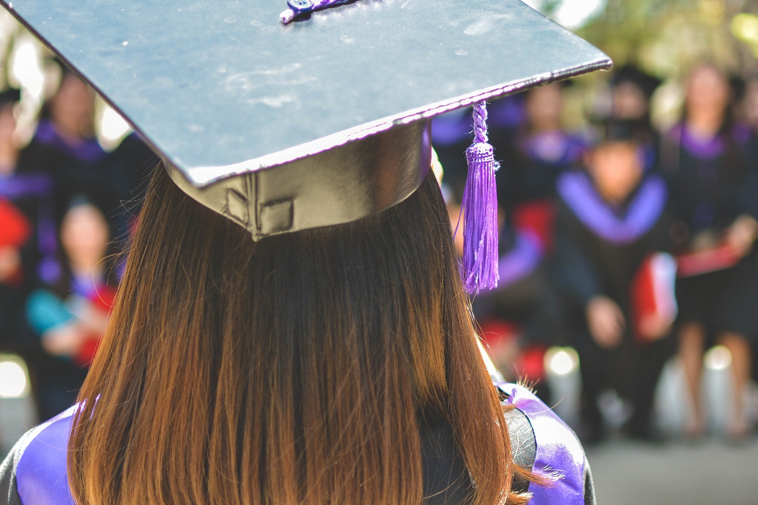 Person with a graduation cap on