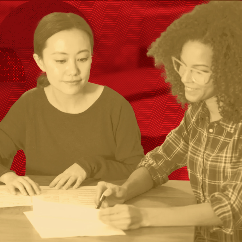 2 girls reading notes