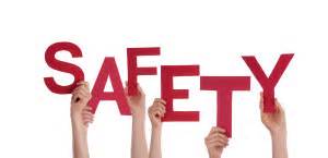 Hands holding up letters to make the word "Safety'