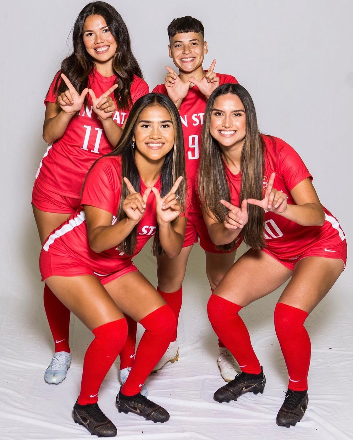 Four members of the women's soccer team