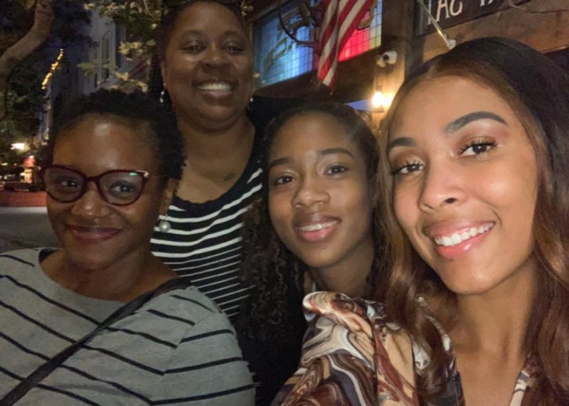 4 women posing for selfie photo