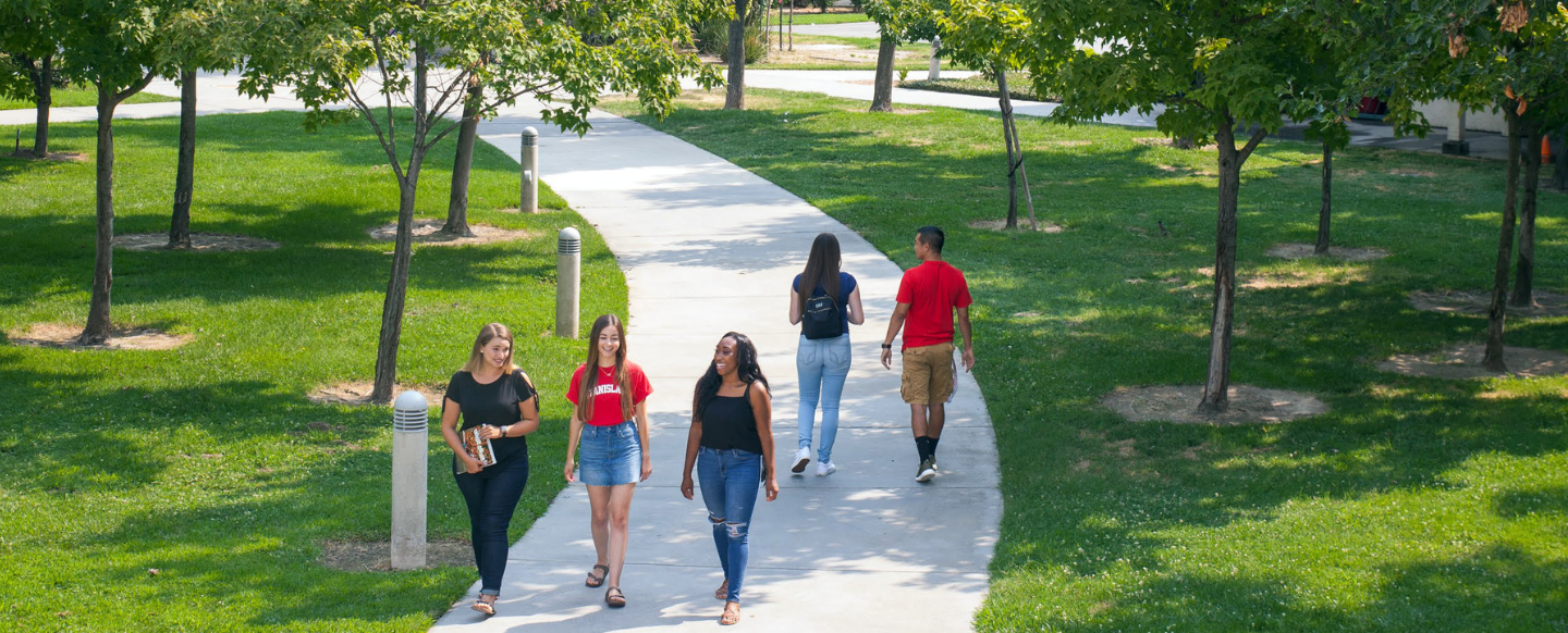 students walking in village 2