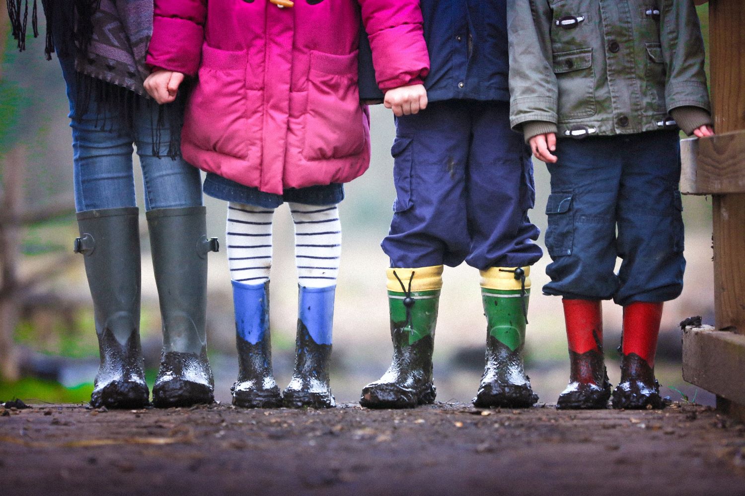 Children standing in the mud
