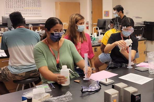 pals_2.jpg People completing an experiment in a lab
