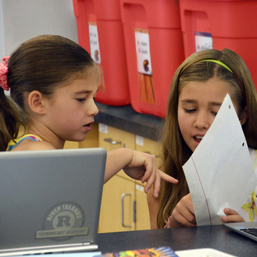 Two students working on an activity