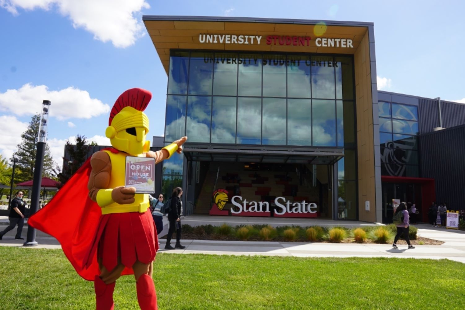 Titus mascot pointing at the Student Center