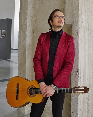 santi321x400.jpg Guitarist Carlos Santi