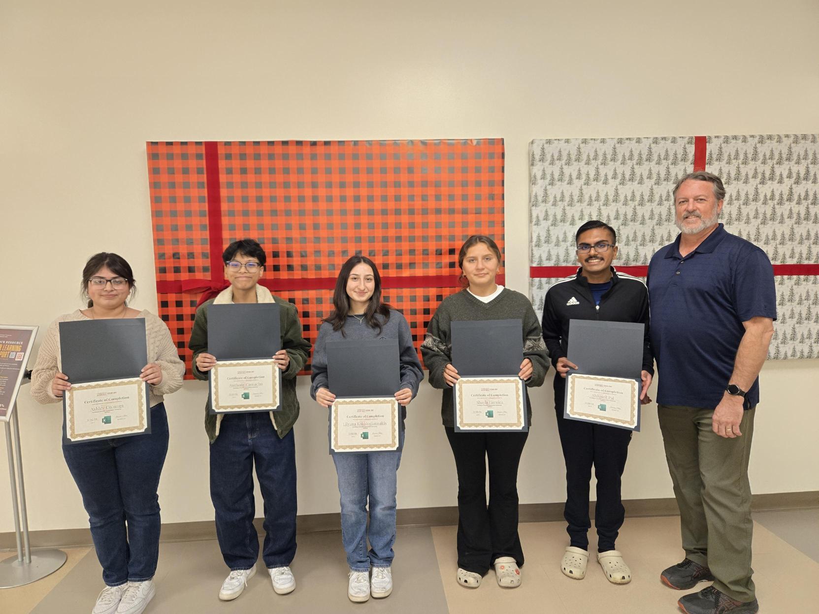 Photo of students that earned their Excel certificates