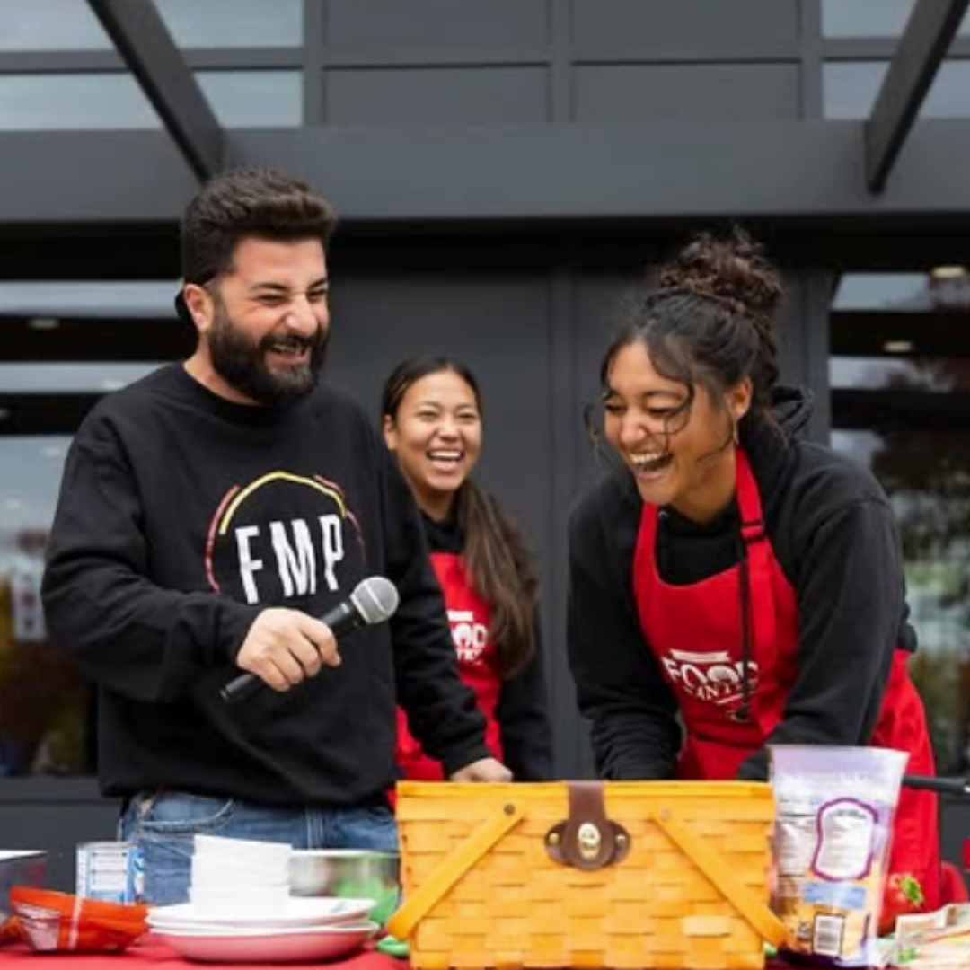 Three participants engaging in a Chopped Challenge event.