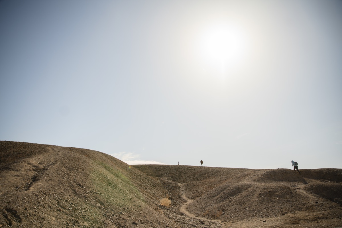 students hiking up Harmony Borax Works hills