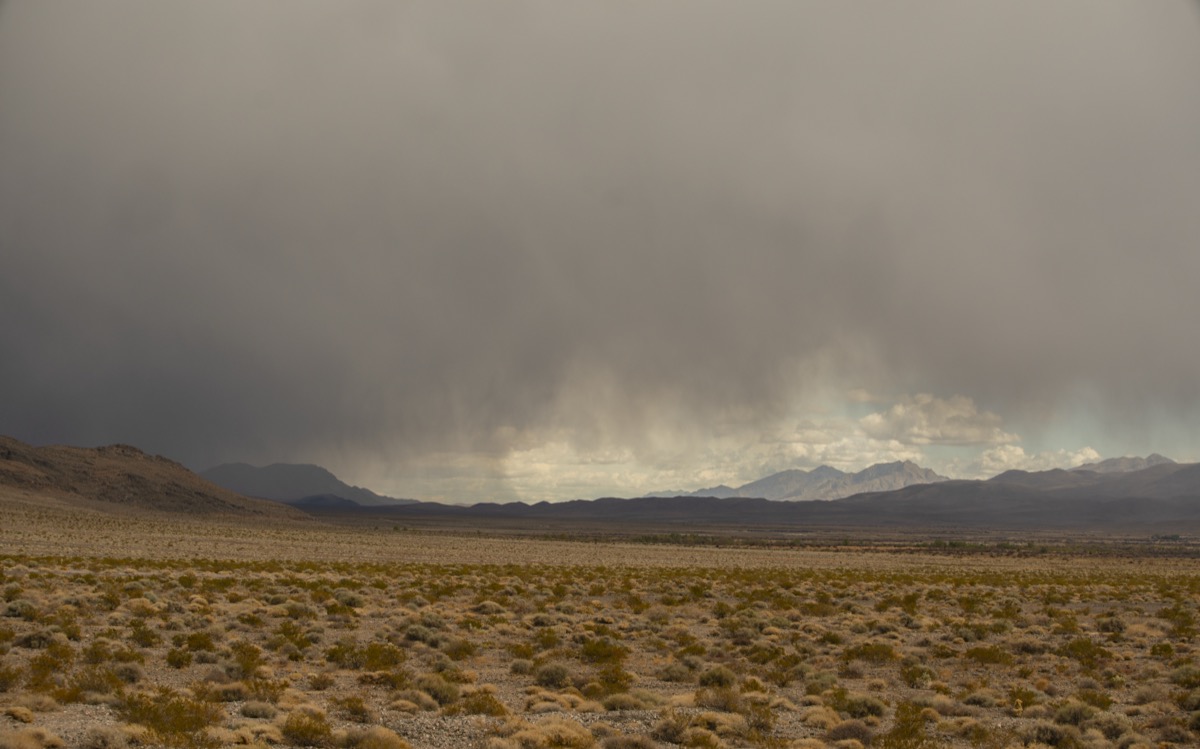 storm seen in the distance from Ubehebe Crater