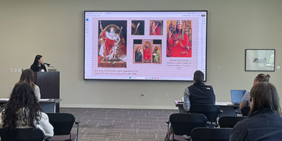 Art History minor Maddie Guevara presenting at the 39th Annual Student Research Competition