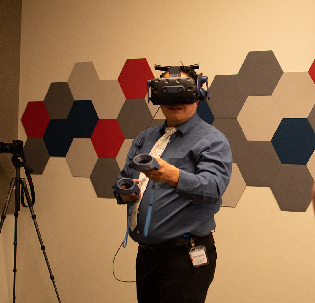 A person uses technology in the Warrior Fab Lab