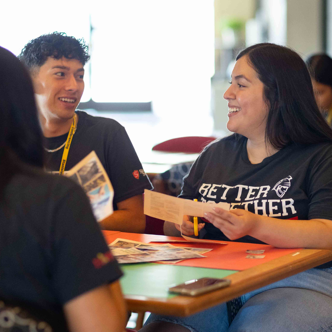 Photo of students interacting.