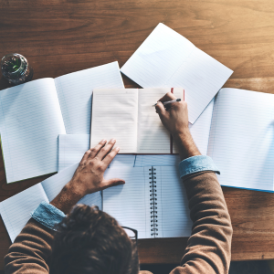 Person writing in a notebook