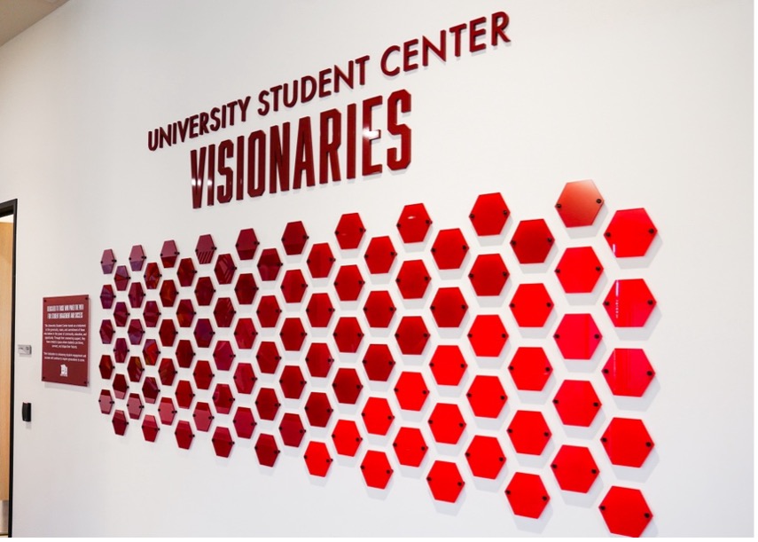 The Visionaries Plaque wall is adorned with donors as seen at the University Student Center