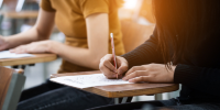 Two students taking a test