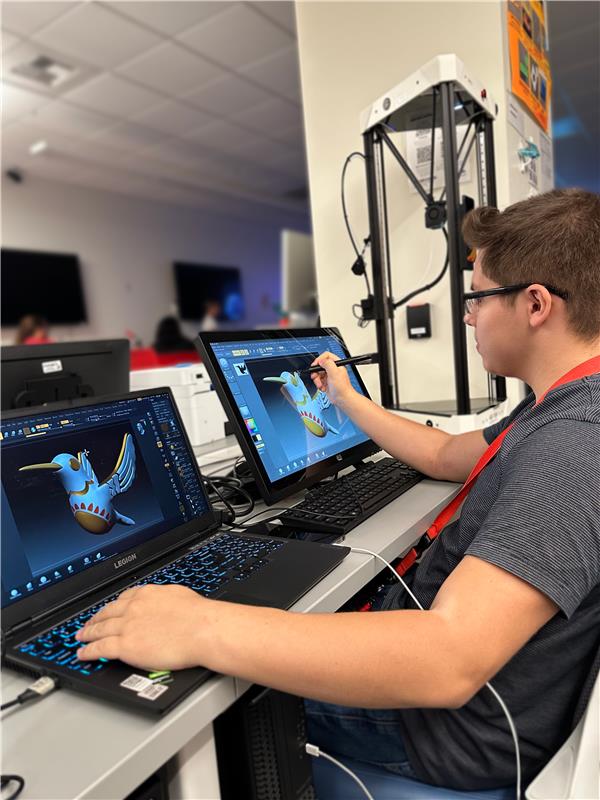 Student working on a computer.