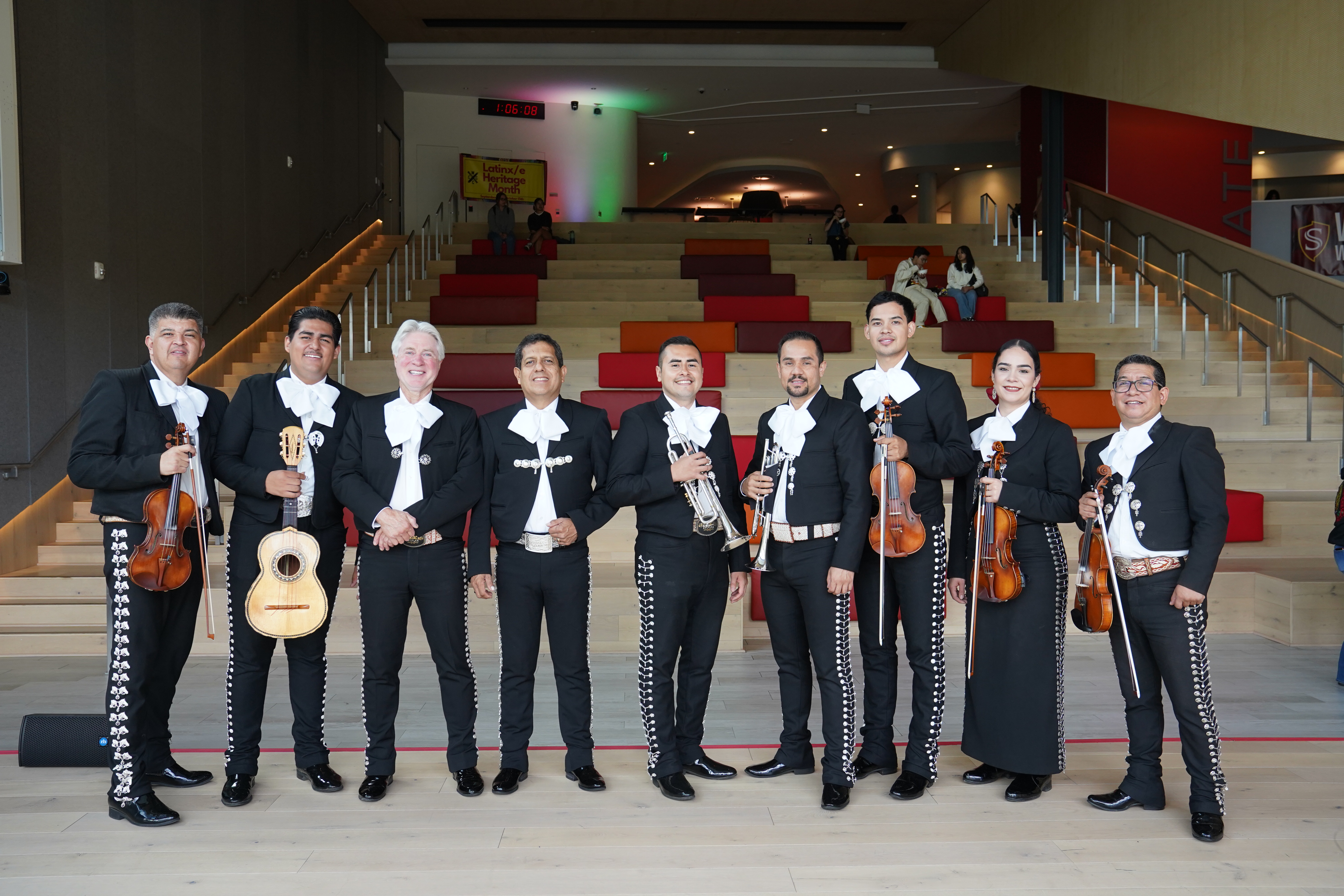 mariachi posing in front of warrior steps