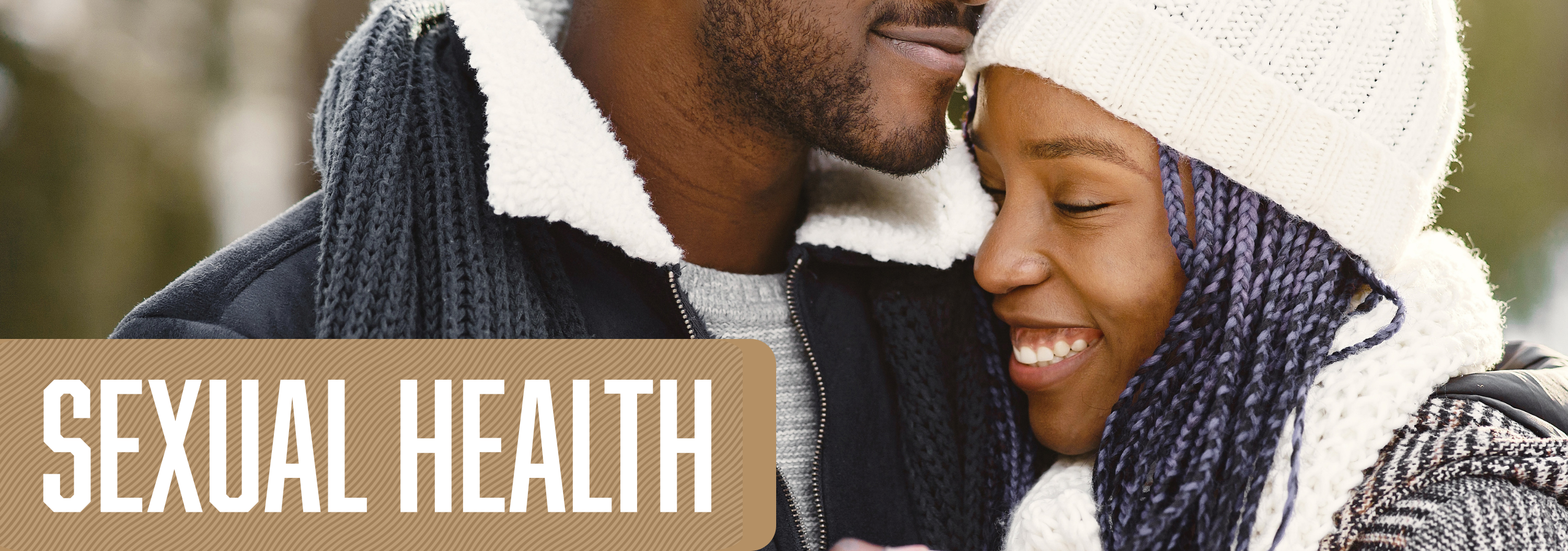 Banner of a couple hugging, titled, sexual health.