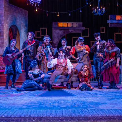 The entire cast of the Great Comet is seen on stage 