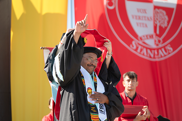 Ed.D. grad at commencement ceremony