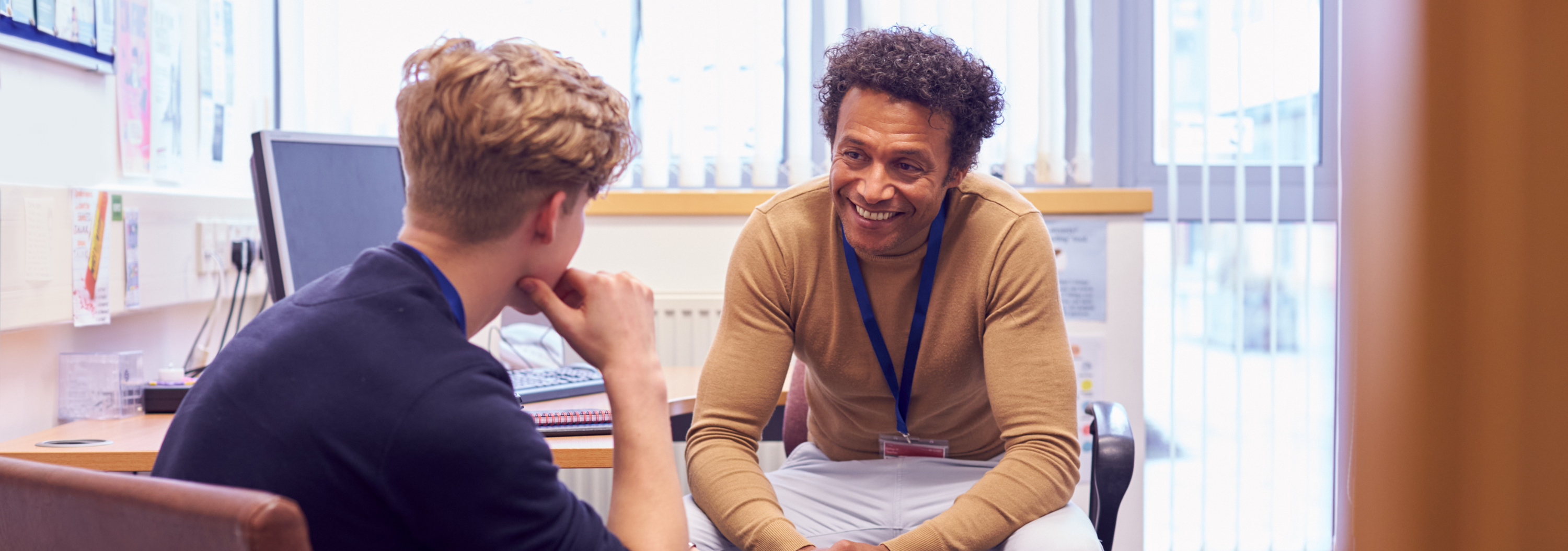 A counselor talking with a student.