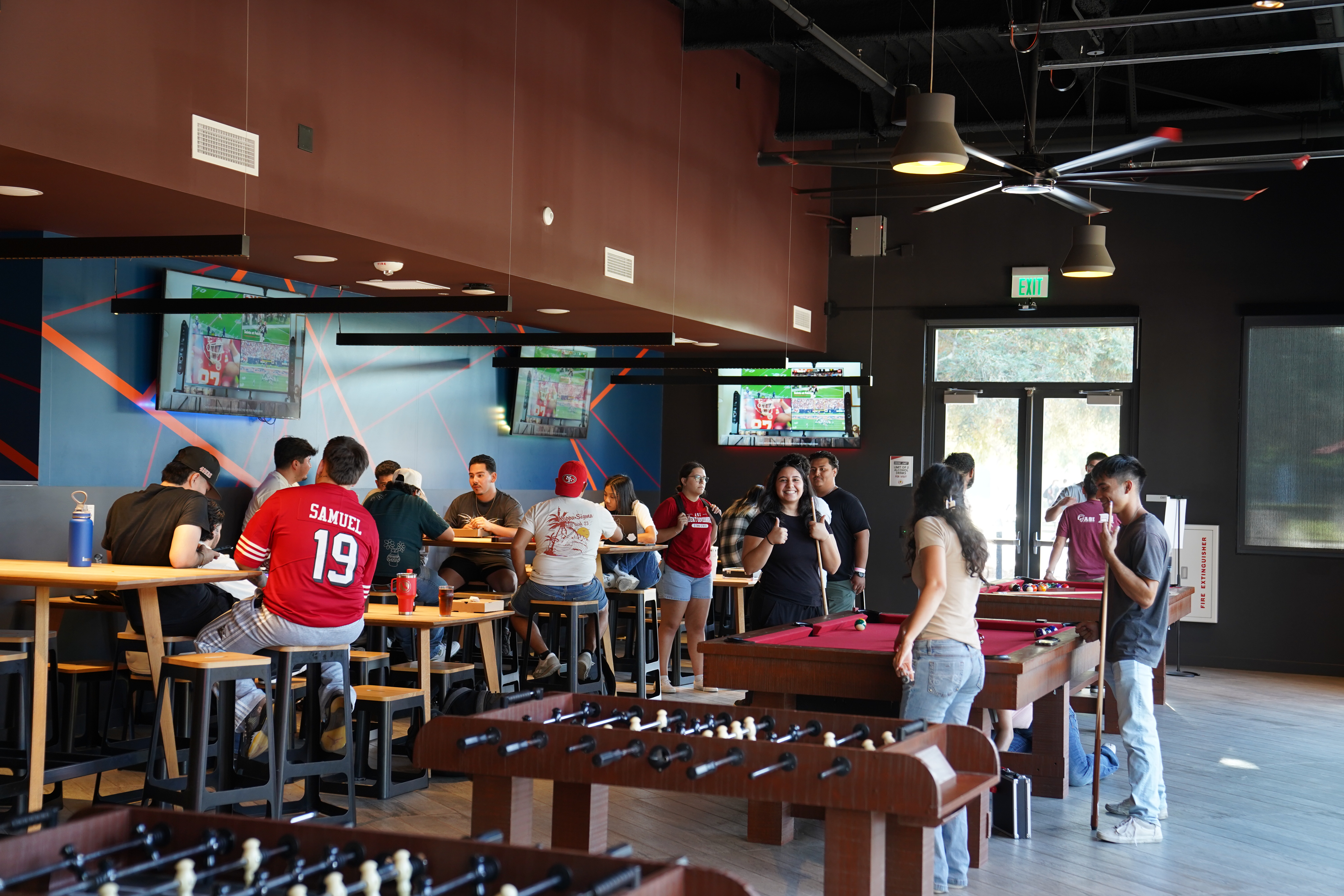 Students playing pool in the Warrior Grill