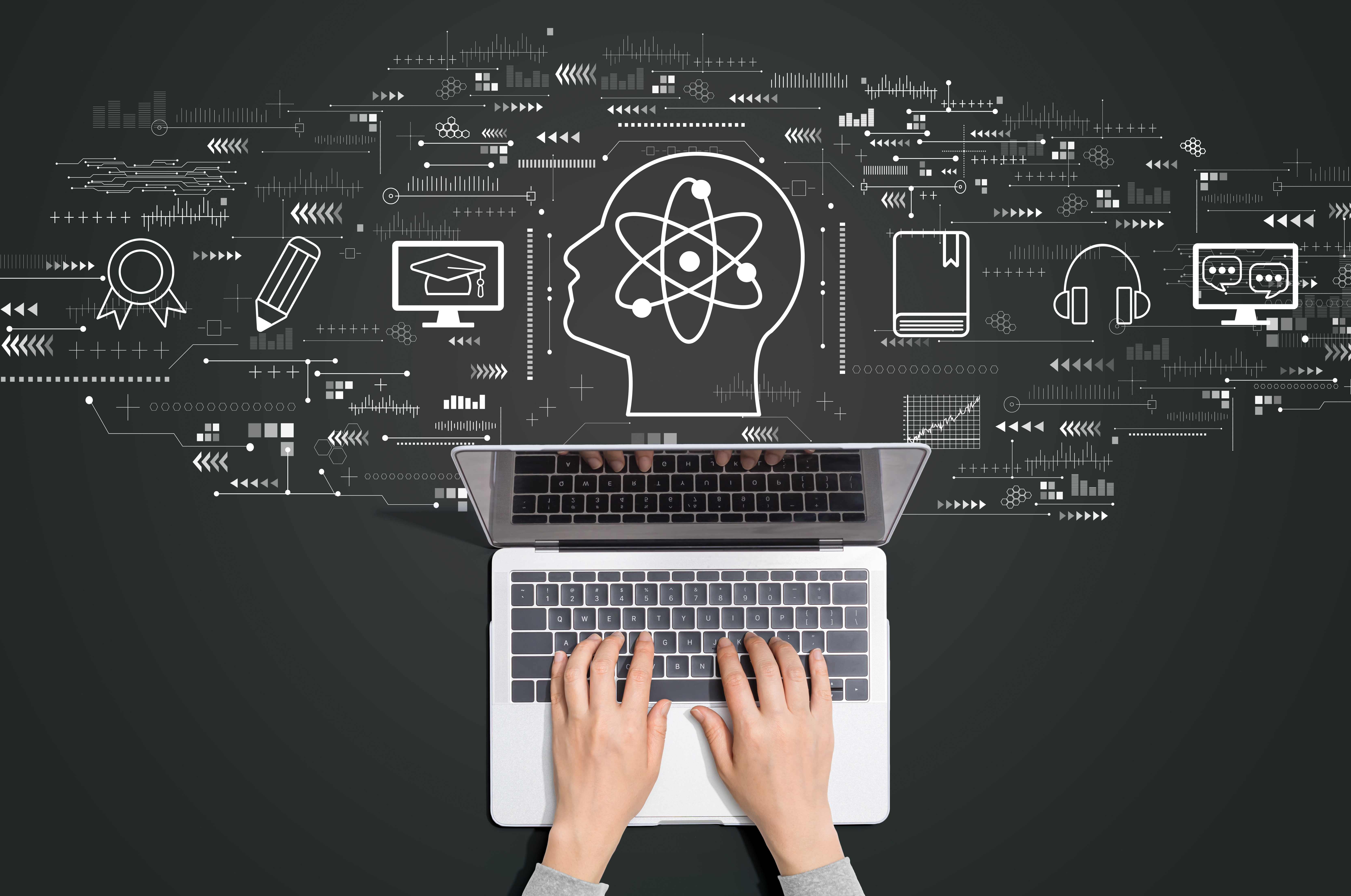 Hands typing on a laptop with digital icons and a head silhouette featuring an atom symbol above, representing online learning and STEM education.