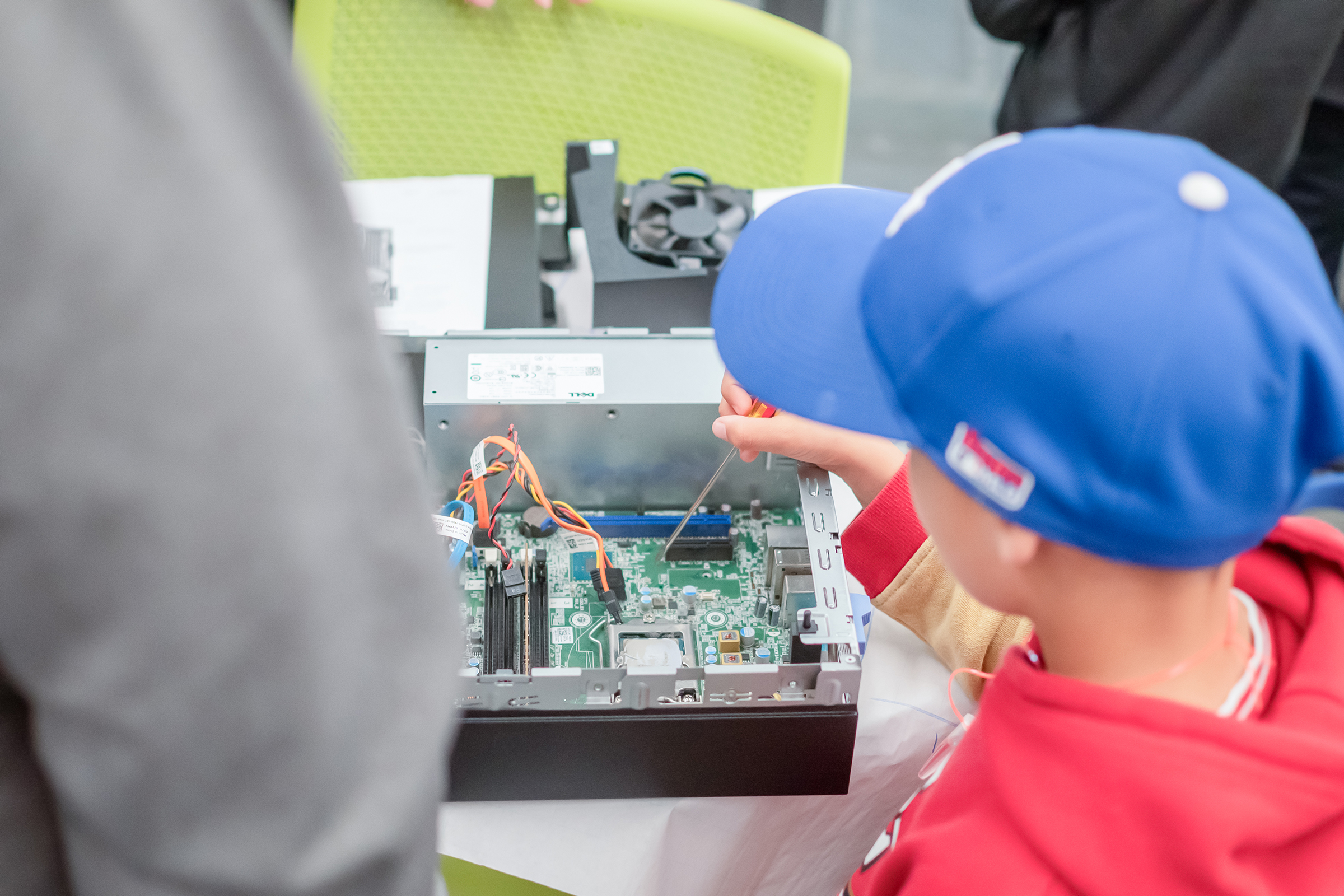 Student at Science Day exploring a computer panel.