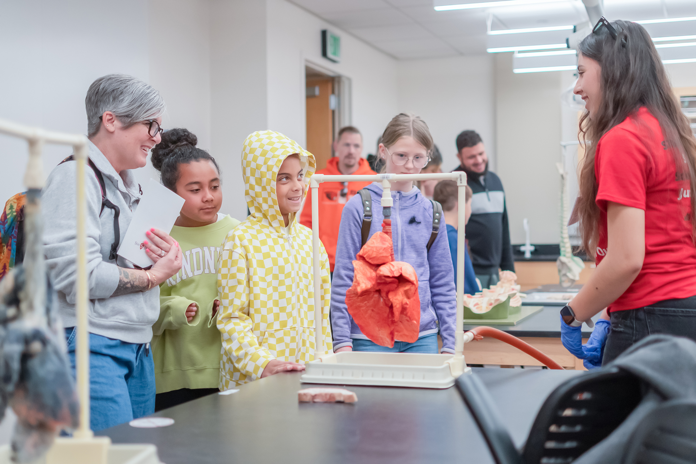 Students at Science Day observe how a lung works.