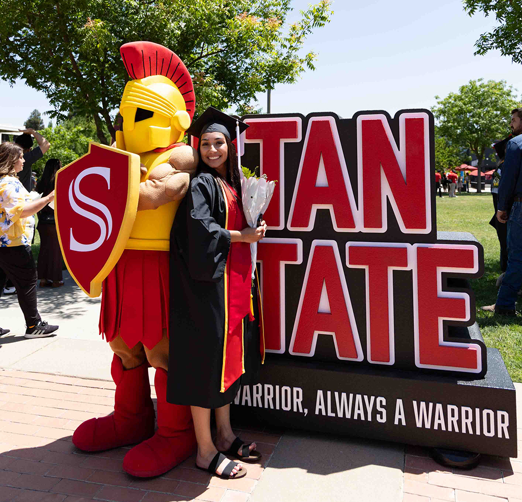 grad with mascot, Titus