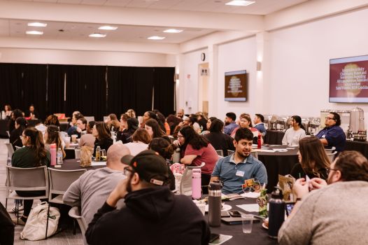 Image of students at a conference