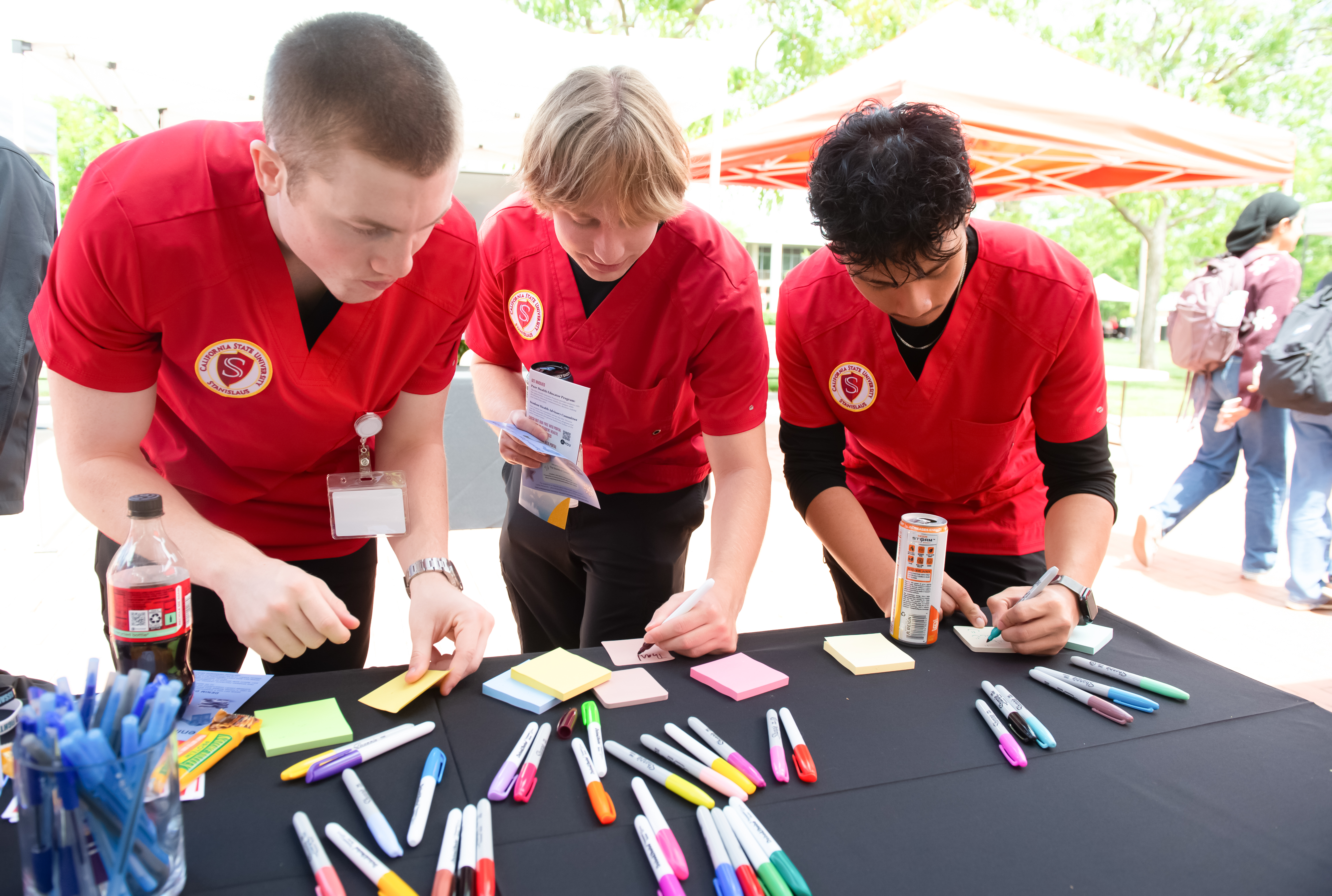Student writing thank you notes