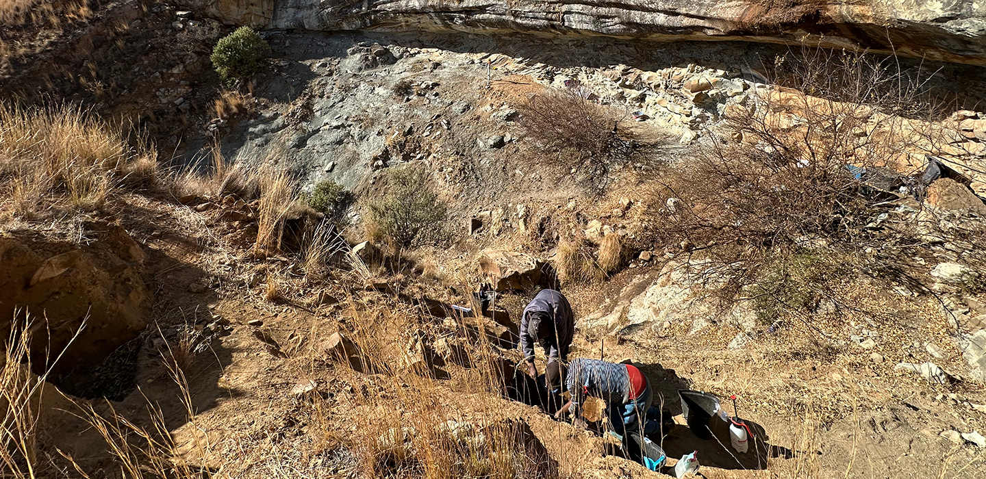 Molopi Matela and Lefa Leanya work at the Likonong Rock Shelter in the mountains of Lesotho.