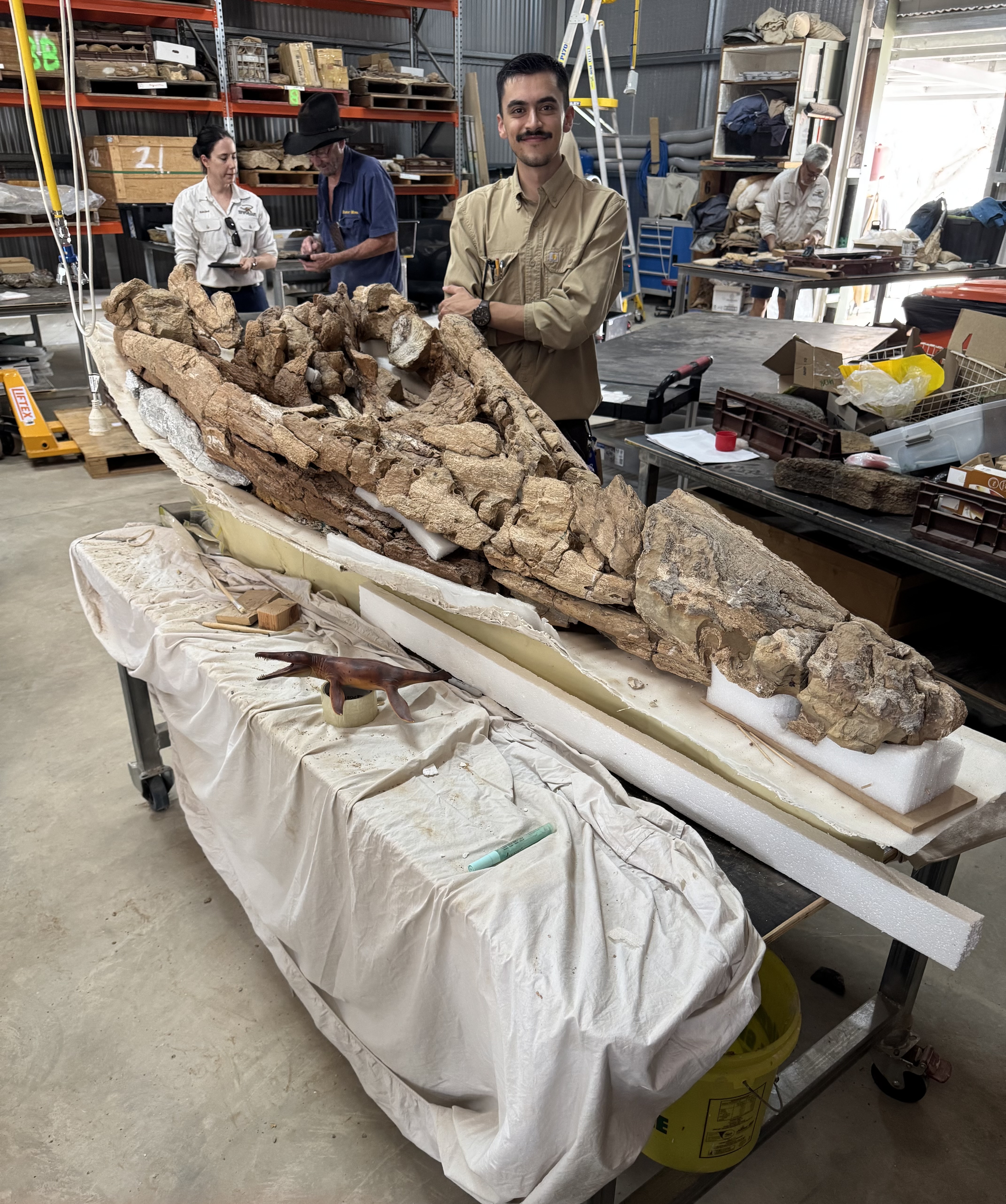 Sebastian Lara with a 110-million-year-old ichthyosaur fossil