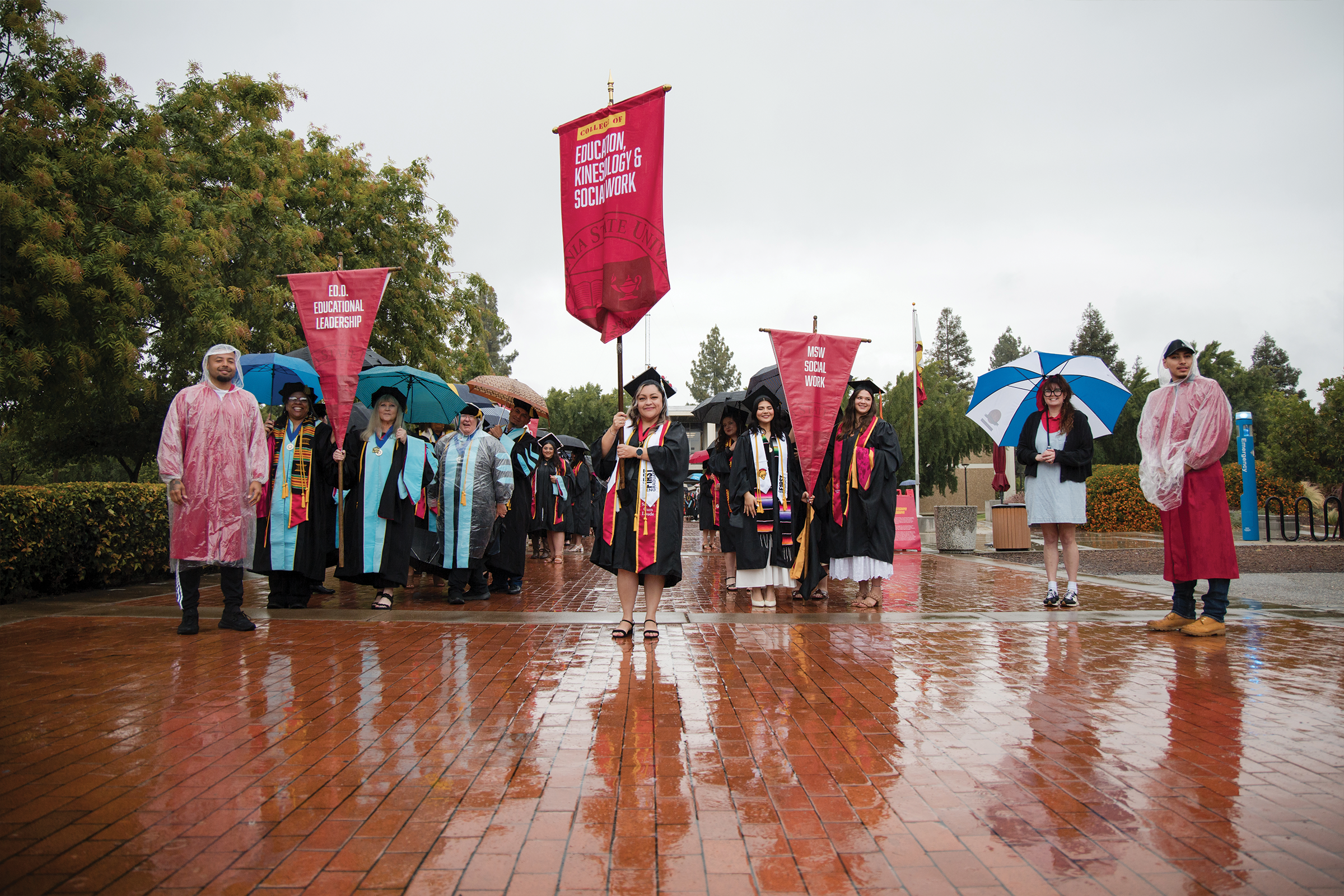 Students in the rain at Commencement