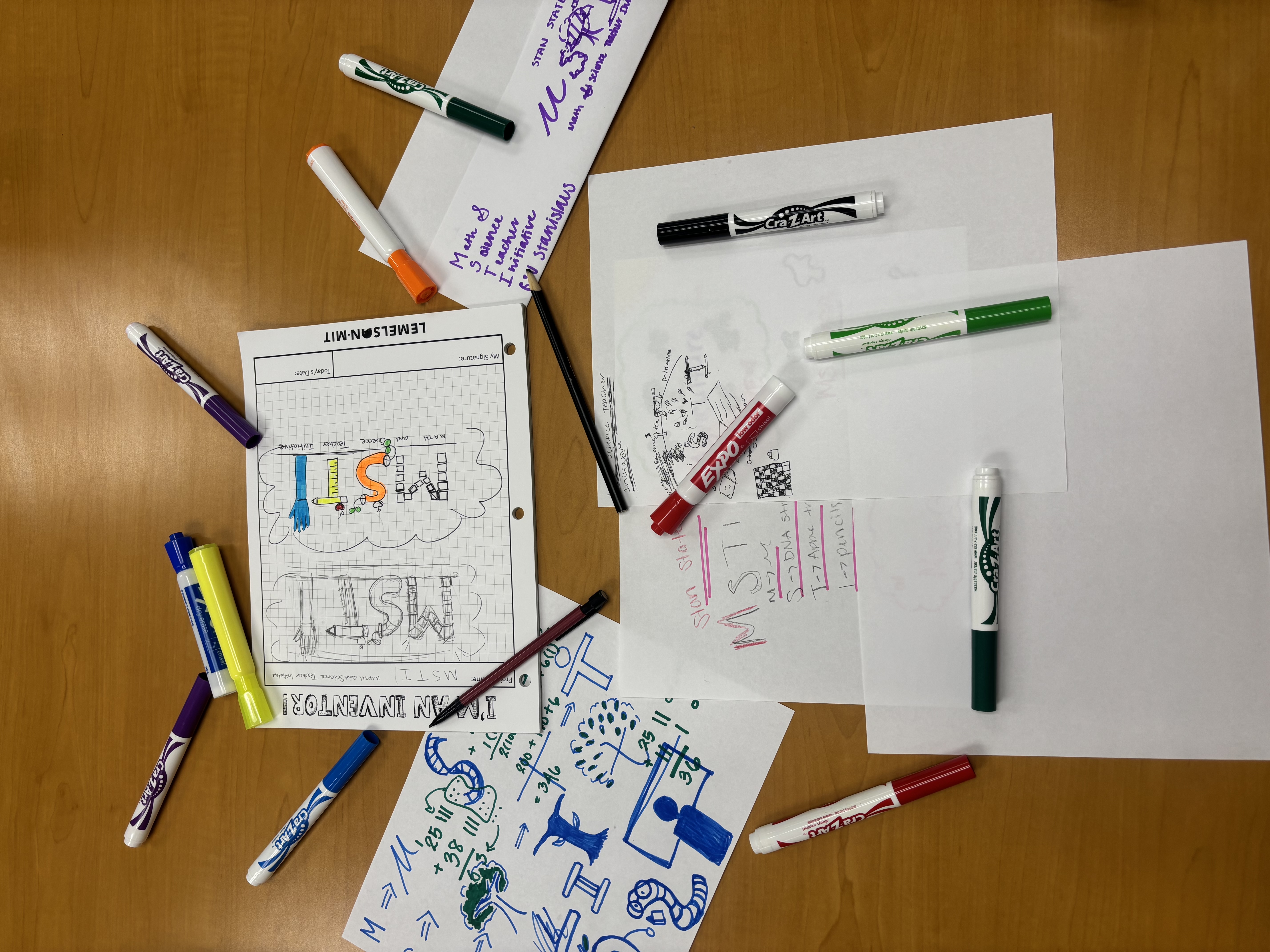 Drawings and markers used to plan the logo for the M.S.T.I. Club.