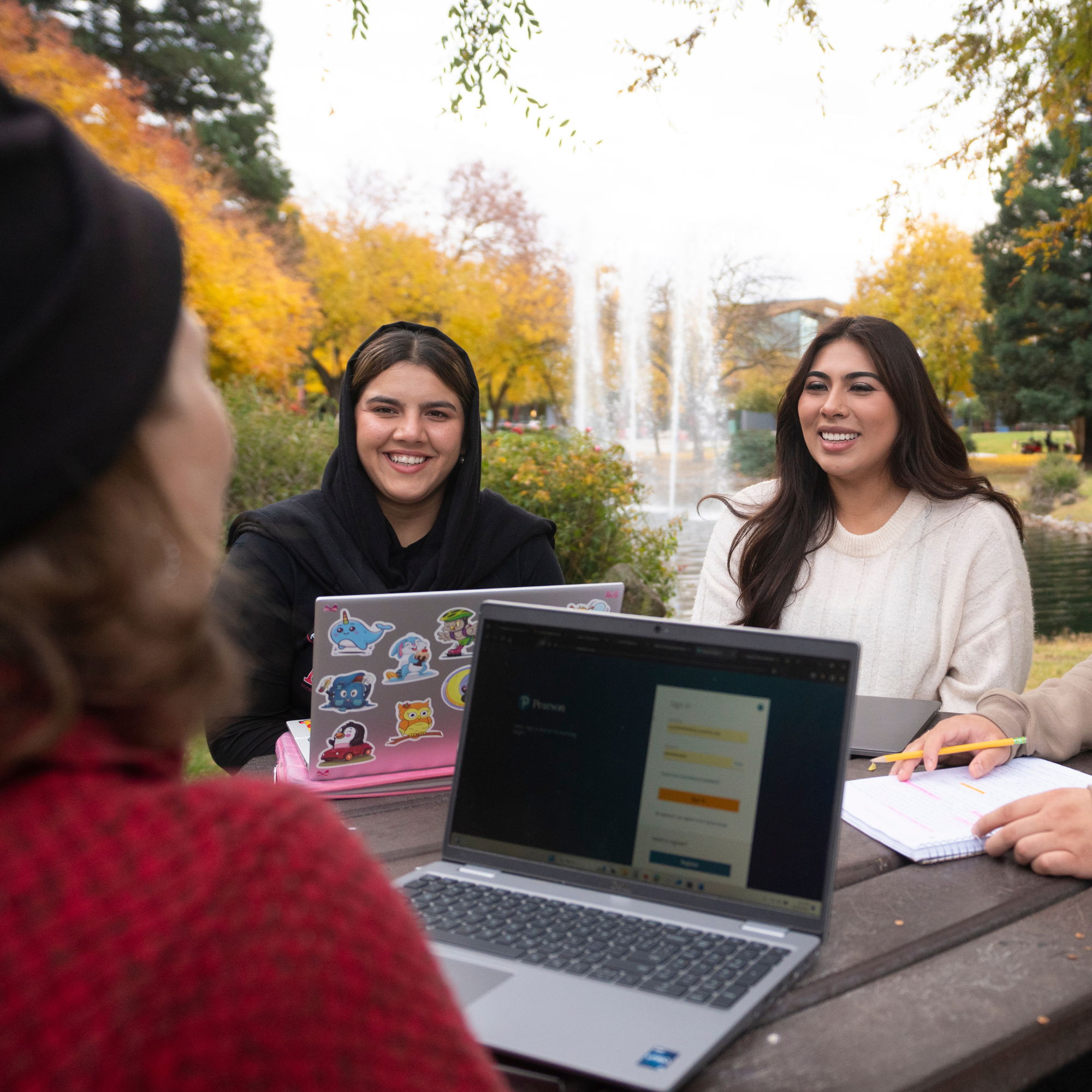 Students on laptops.