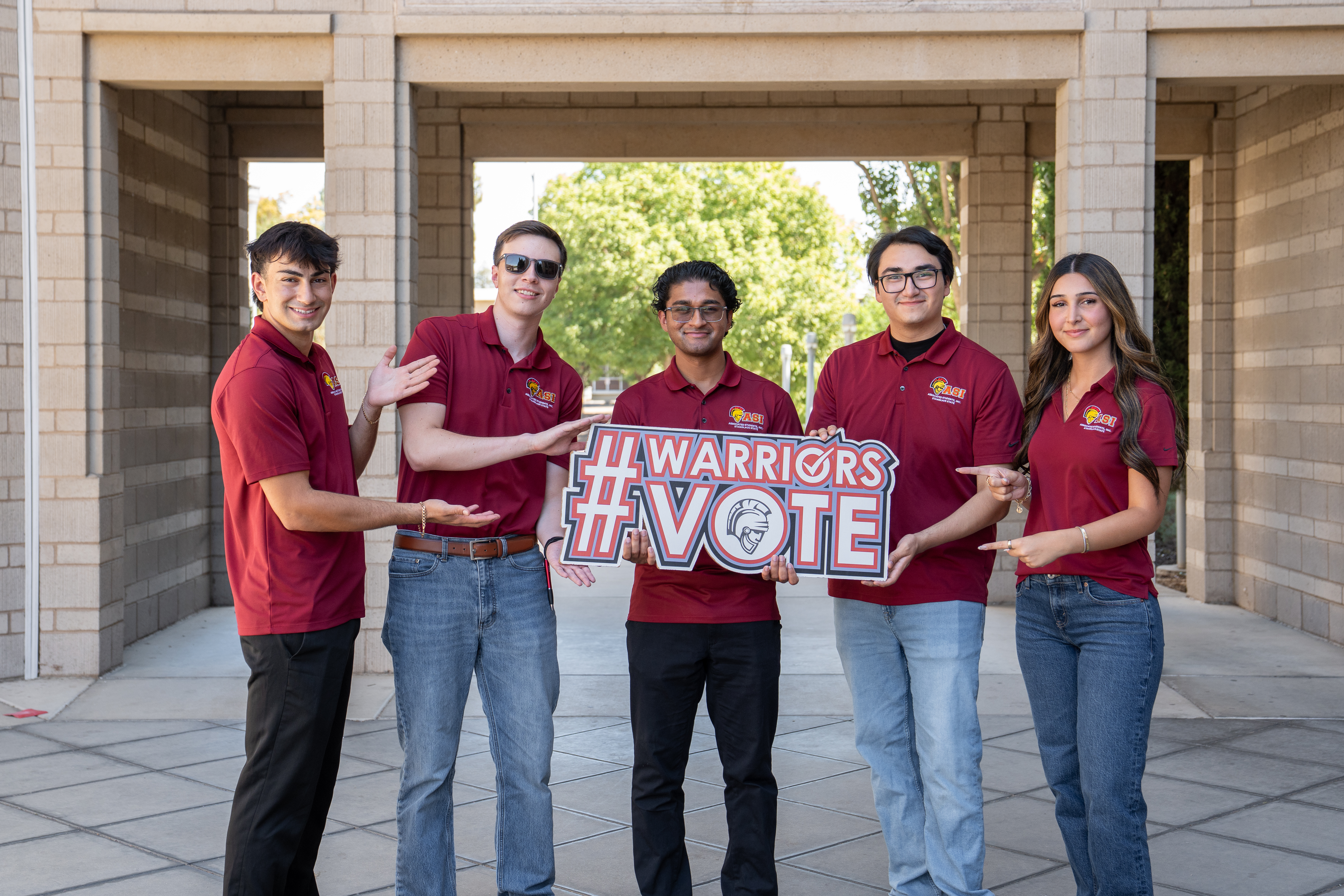 ASI Student Government holding up Warriors Vote Logo