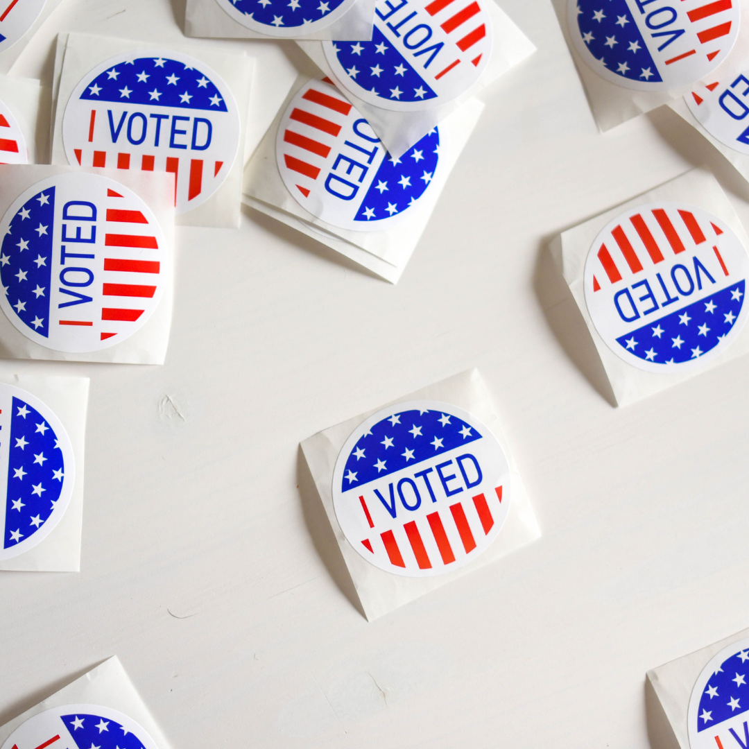 A cluster of election day stickers.