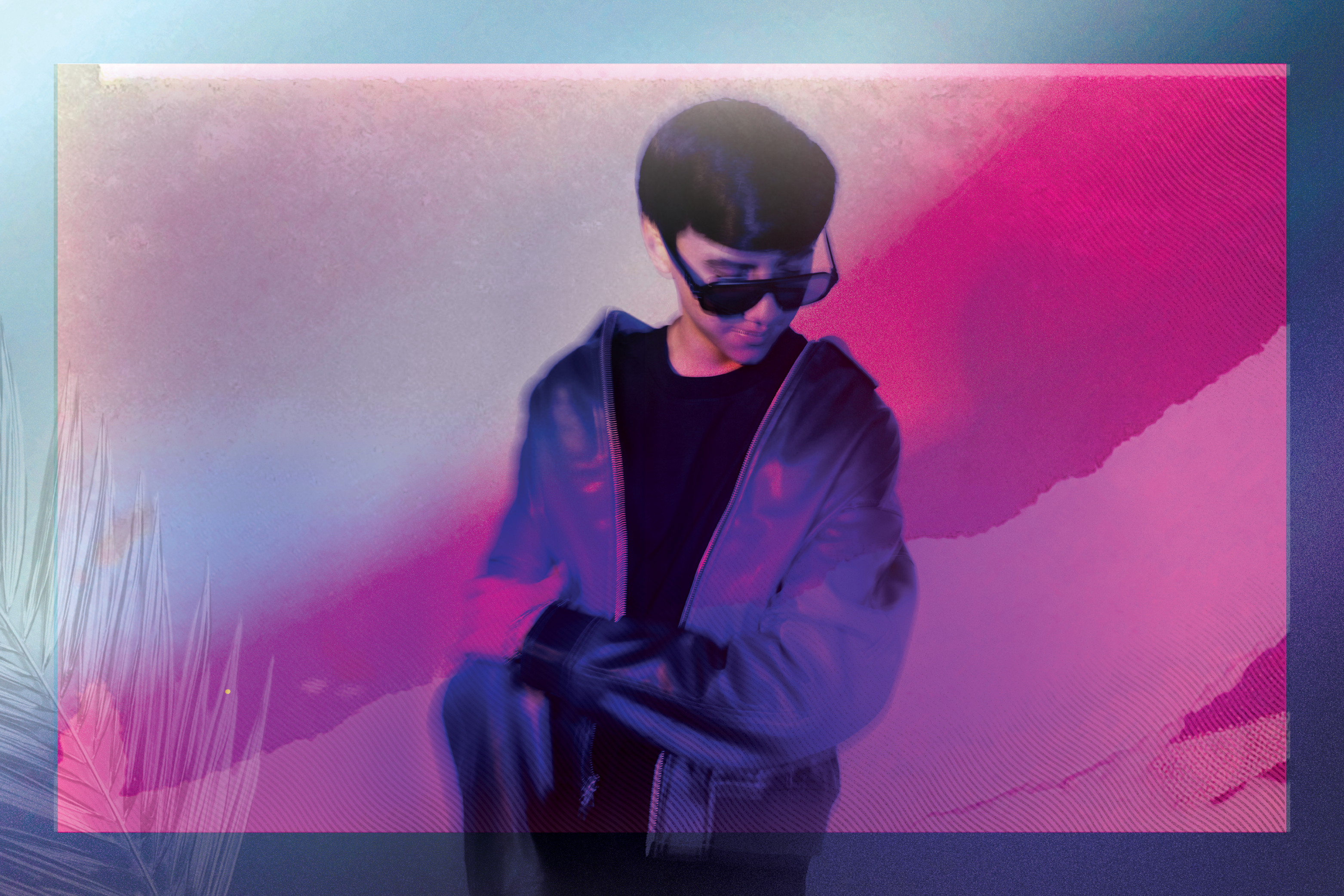 A young person in dark sunglasses and a blue jacket sits with arms folded against a pink and purple backdrop, conveying a cool, introspective mood.
