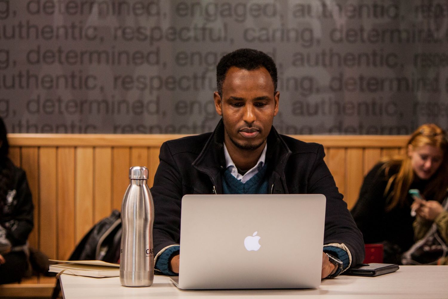 stock image of black student at a computer