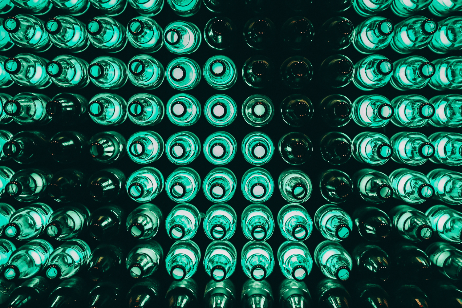 Green bottles lined up.
